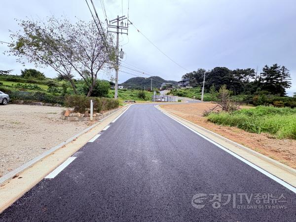 [크기변환]2-2. 용인특례시는 평창마을회관 버스정류장~평창리 173-1번지를 잇는 길이 515m 폭 6m의 도로를 준공했다.jpg